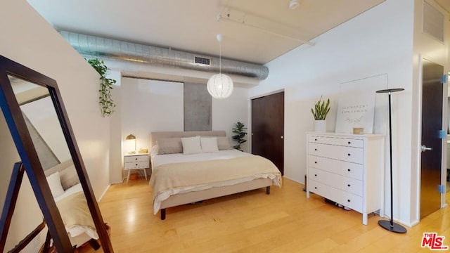 bedroom featuring light hardwood / wood-style flooring