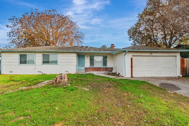 ranch-style home featuring a front yard and a garage