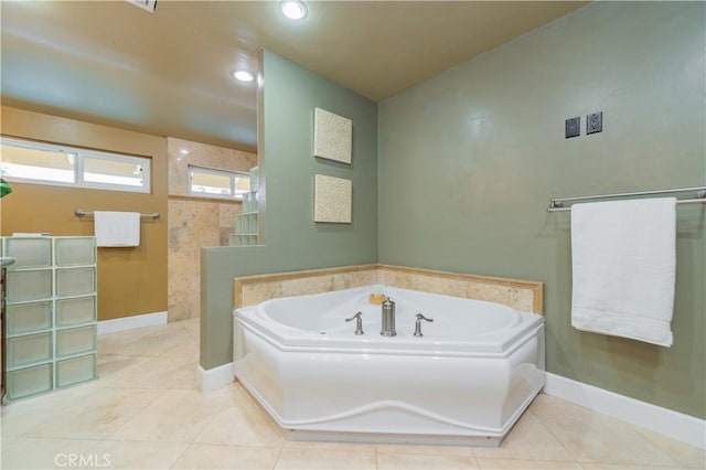 bathroom featuring tile patterned flooring and plus walk in shower