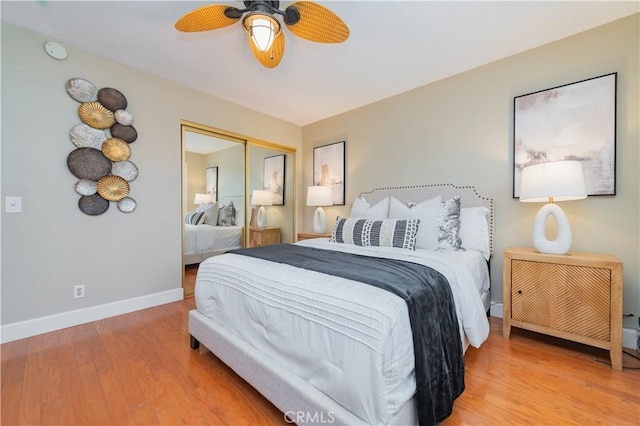 bedroom with a closet, ceiling fan, and hardwood / wood-style floors