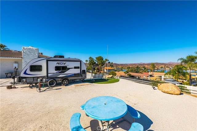 surrounding community featuring a mountain view