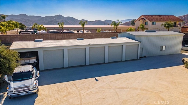 garage featuring a mountain view