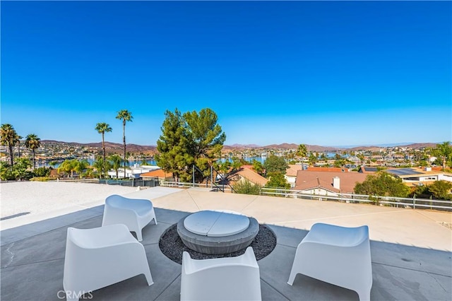 view of pool with a patio area and a mountain view