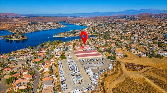 bird's eye view featuring a water and mountain view