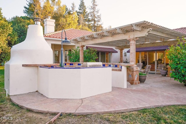 view of patio featuring a pergola