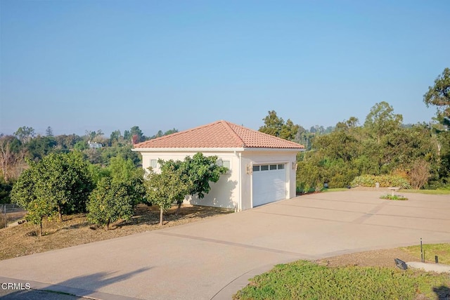 exterior space featuring a garage