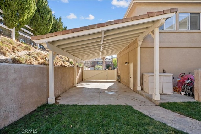 view of parking featuring a carport