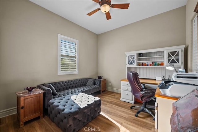 home office with ceiling fan and wood-type flooring