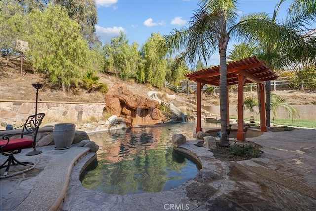 view of patio featuring a pergola