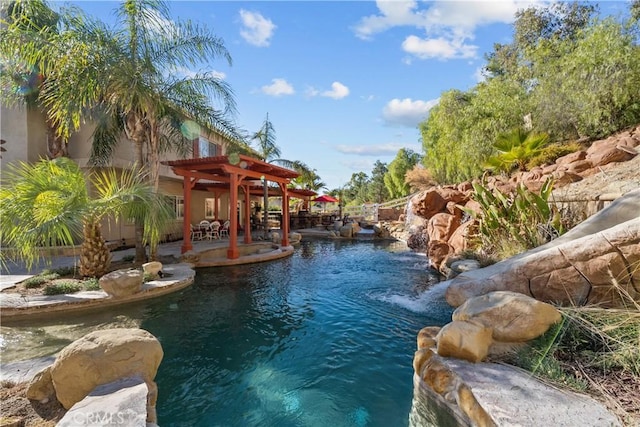 view of pool featuring a patio