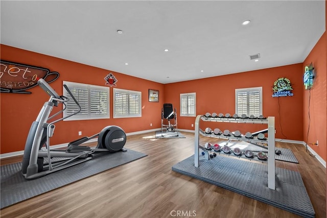 exercise area with hardwood / wood-style floors