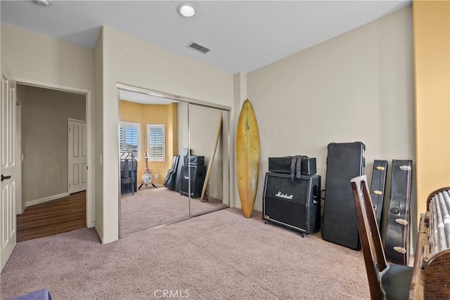 office area featuring light carpet