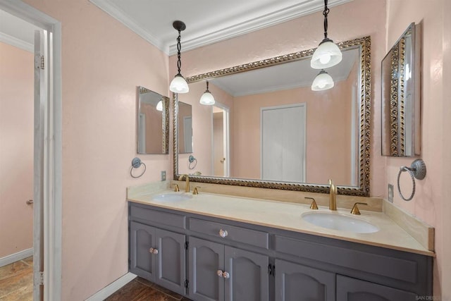 bathroom featuring vanity and ornamental molding