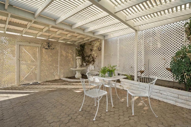 view of patio featuring a pergola