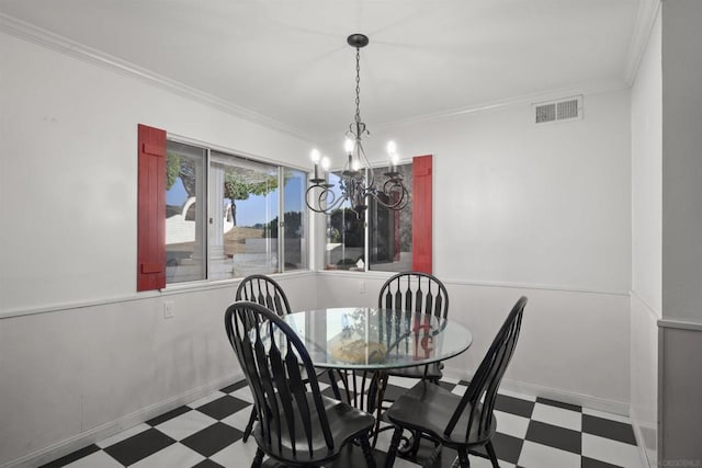 dining space with a chandelier and ornamental molding