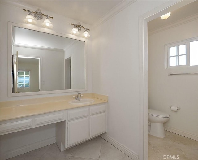 bathroom with vanity, crown molding, and toilet