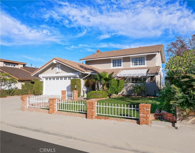 traditional home with a front yard, an attached garage, concrete driveway, a fenced front yard, and a tile roof