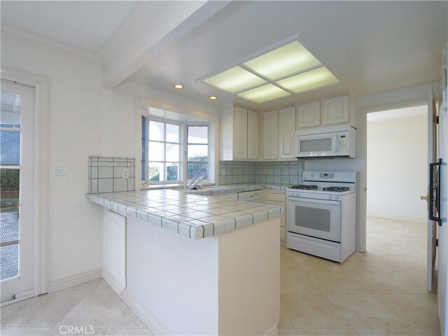 28708 Mount Sawtooth Dr, Rancho Palos Verdes, CA 90275 - kitchen featuring white appliances, tile countertops, a peninsula, light tile patterned floors, and backsplash