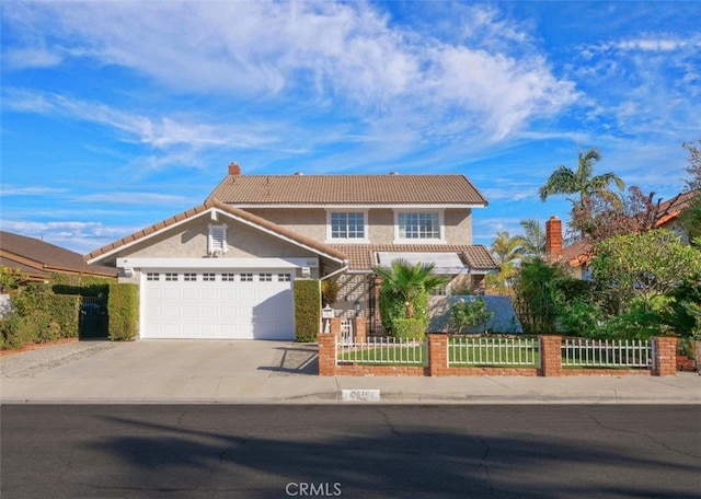 28708 Mount Sawtooth Dr, Rancho Palos Verdes, CA 90275 - traditional-style home with a fenced front yard, concrete driveway, a tile roof, an attached garage, and stucco siding