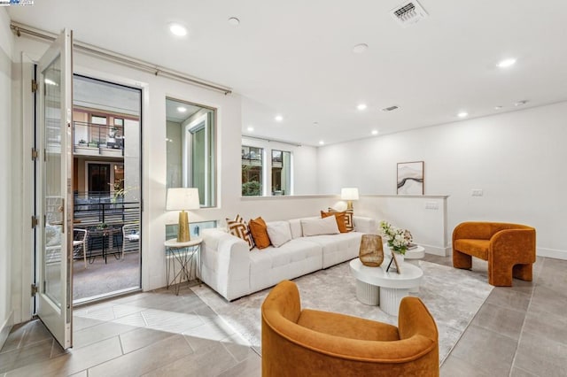 living room with light tile patterned floors