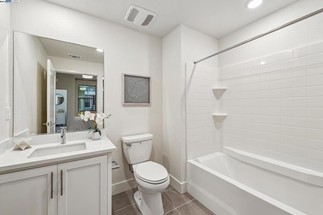 full bathroom with vanity, toilet, shower / washtub combination, and tile patterned floors