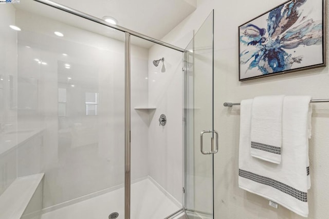 bathroom with an enclosed shower