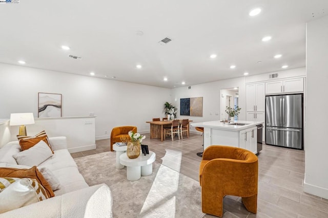 living room featuring sink