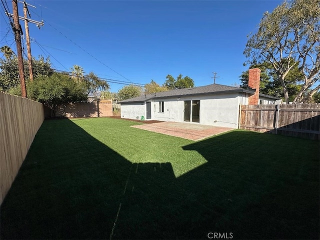 view of yard with a patio area