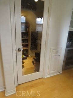 hallway featuring hardwood / wood-style flooring