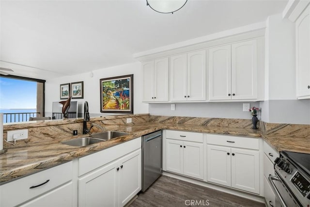 kitchen featuring sink, stone countertops, dark hardwood / wood-style flooring, stainless steel appliances, and white cabinets