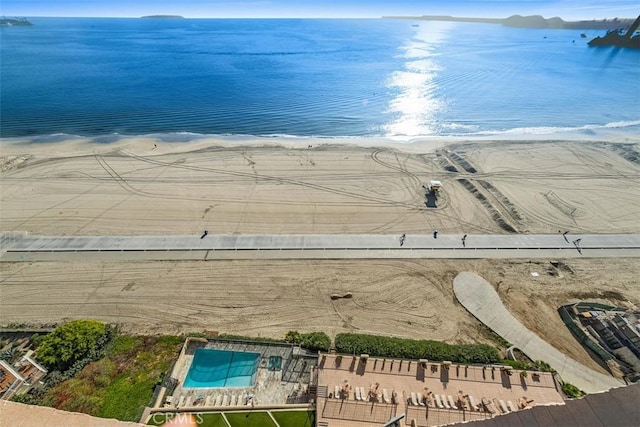 bird's eye view with a view of the beach and a water view