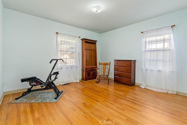 exercise area with hardwood / wood-style floors