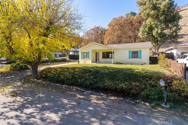 view of front of house with a front yard