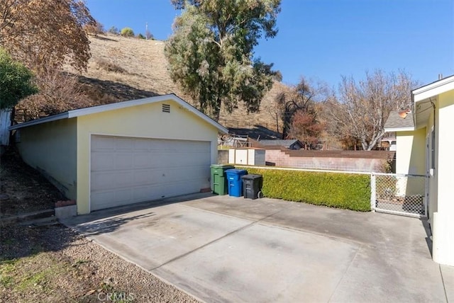 garage with a lawn