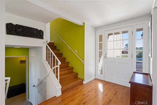 foyer with light wood-type flooring