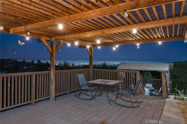 deck at night with a water view