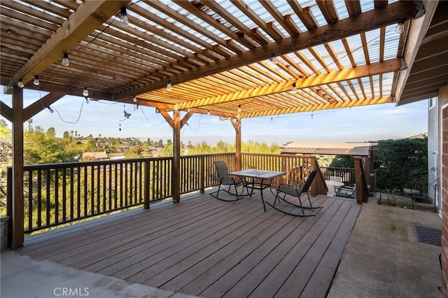 wooden terrace featuring a pergola