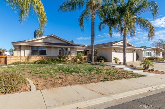 single story home with a garage