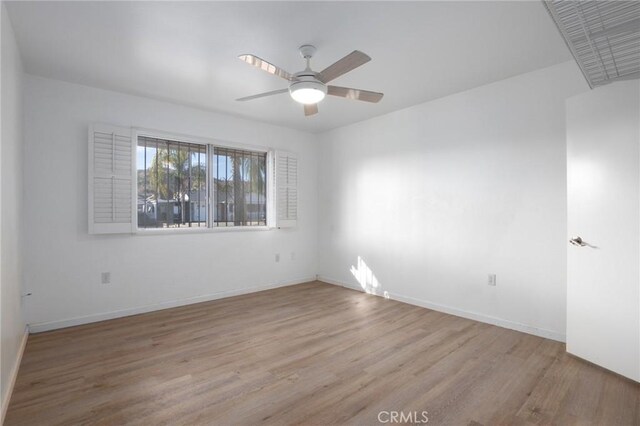 unfurnished room with light hardwood / wood-style floors and ceiling fan