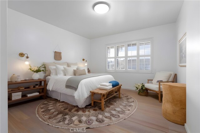 bedroom featuring hardwood / wood-style floors