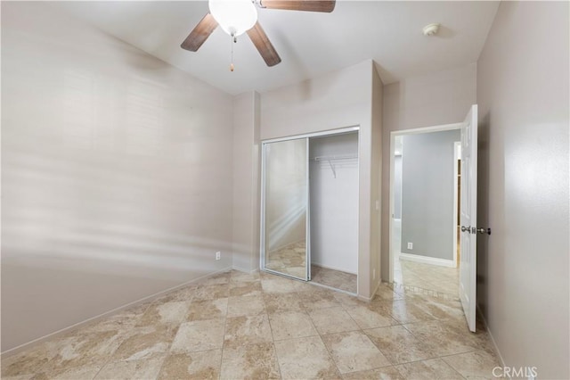 unfurnished bedroom featuring a closet and ceiling fan