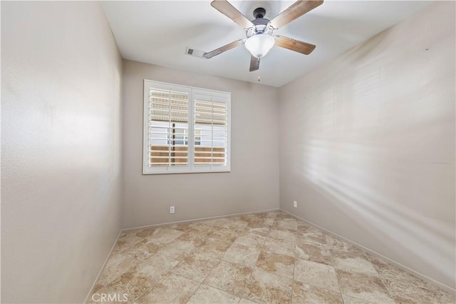 empty room featuring ceiling fan