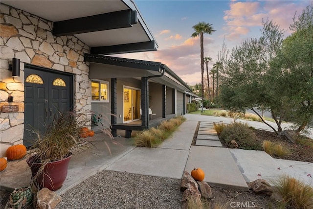 view of property exterior at dusk