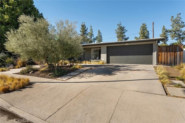 single story home with a garage