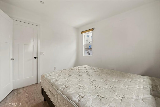 bedroom featuring hardwood / wood-style floors