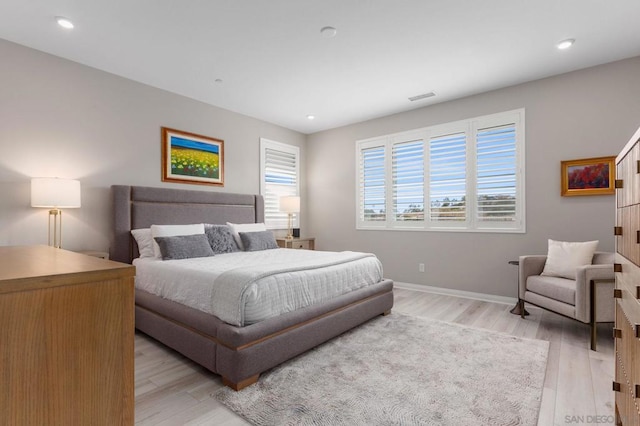 bedroom featuring light wood-type flooring