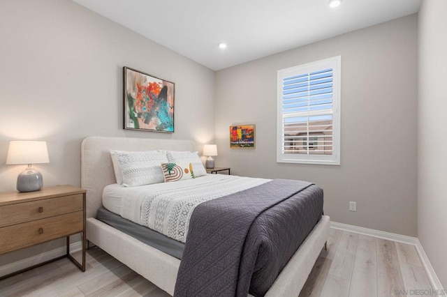 bedroom with light wood-type flooring