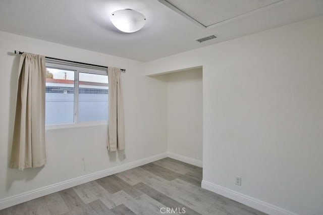 empty room featuring light wood-type flooring