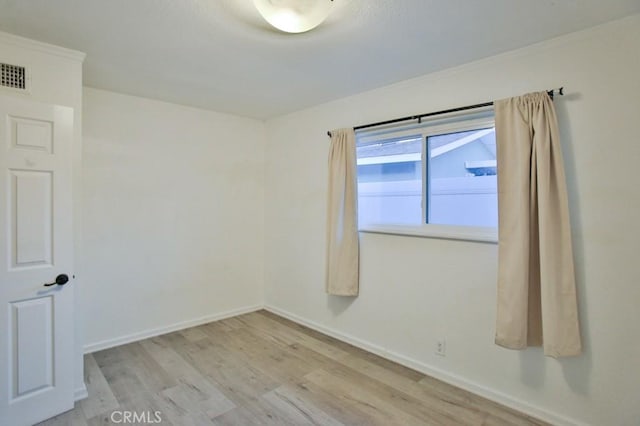 unfurnished room featuring light wood-type flooring