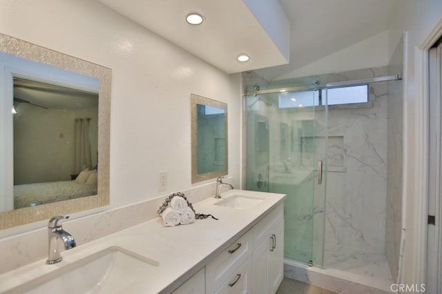 bathroom with vanity and walk in shower